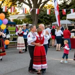 Community celebration at Polish festival highlighting https://www.sfpol.com/ cultural heritage with food, music, and traditional dance.